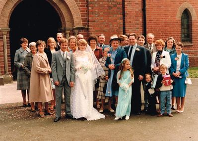 Sue And Andy  Wedding Group Outside Church  
