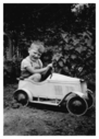 Michael_Poole_in_Peddle_Car.jpg